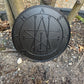 Matte black King Solomon’s Lesser Key Goetia seal ritual tool with intricate infernal sigil design.